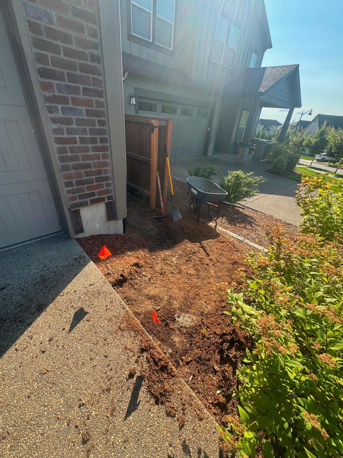 Front entry walkway excavated and prepped before paver installation